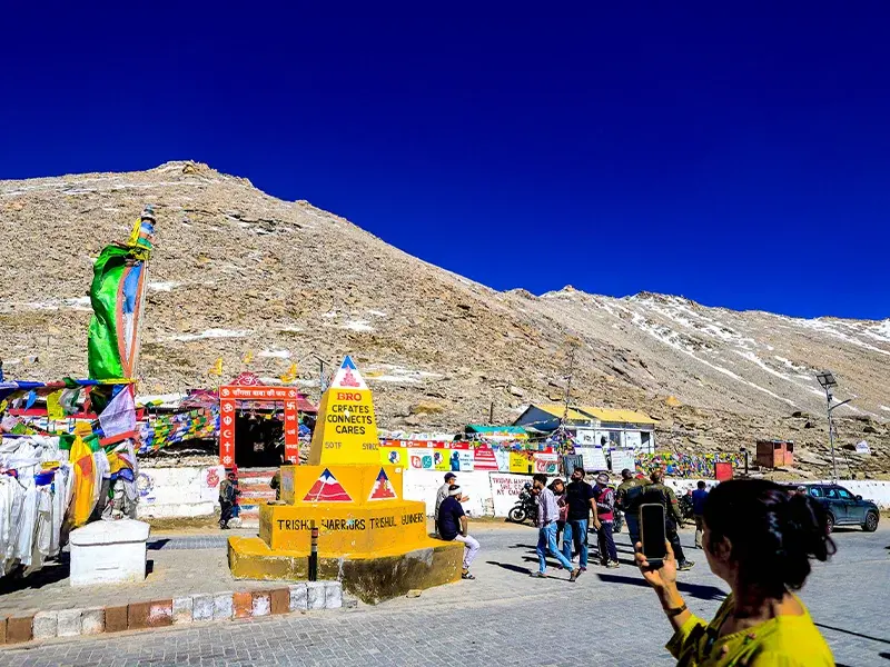  Chang La pass covered in snow with prayer flags